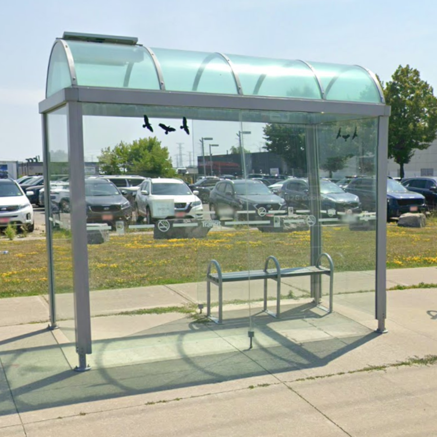 Photo of DRT bus shelter on a sunny day. 