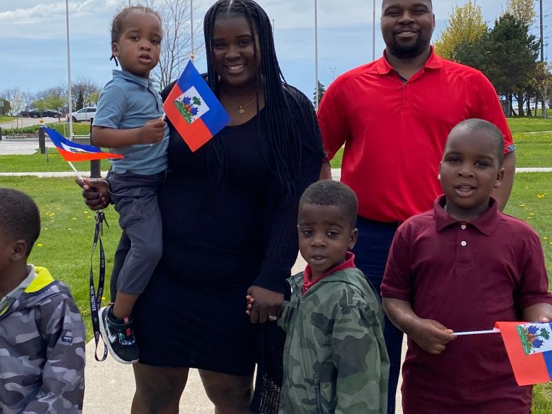 A family celebrating Haitian Flag Day