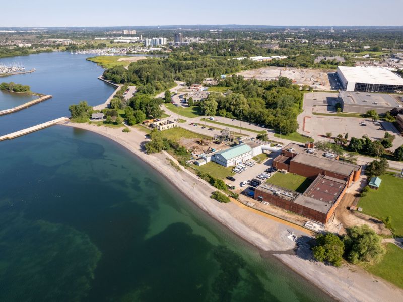 An aerial view of Whitby Water Supply Plant featuring the waterfront and surrounding neighbourhoods and infrastructure.